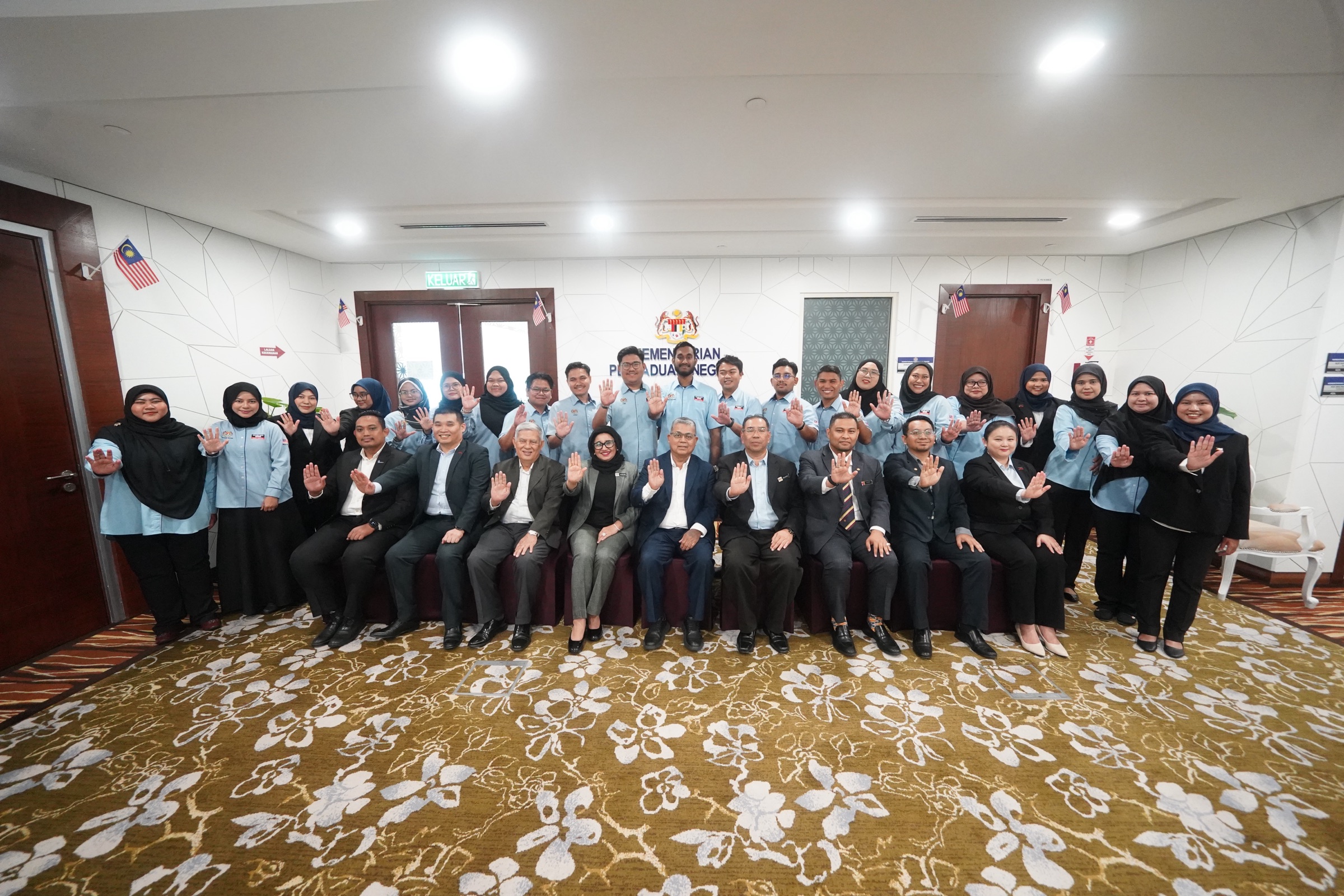 YSS team with Ministry of National Unity officials in a group photo