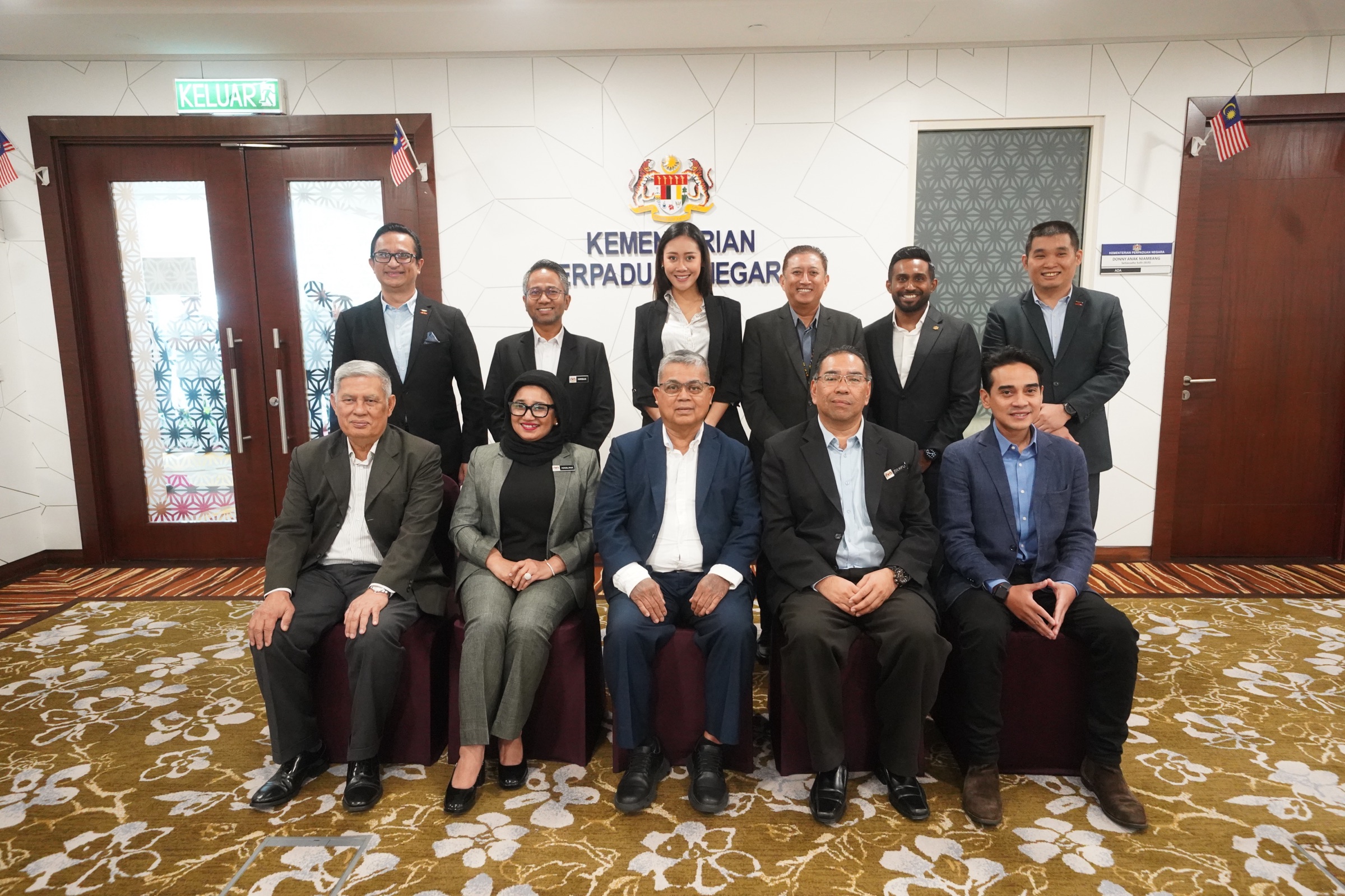 YSS Board of Directors and Ministry of National Unity officials in a group photo